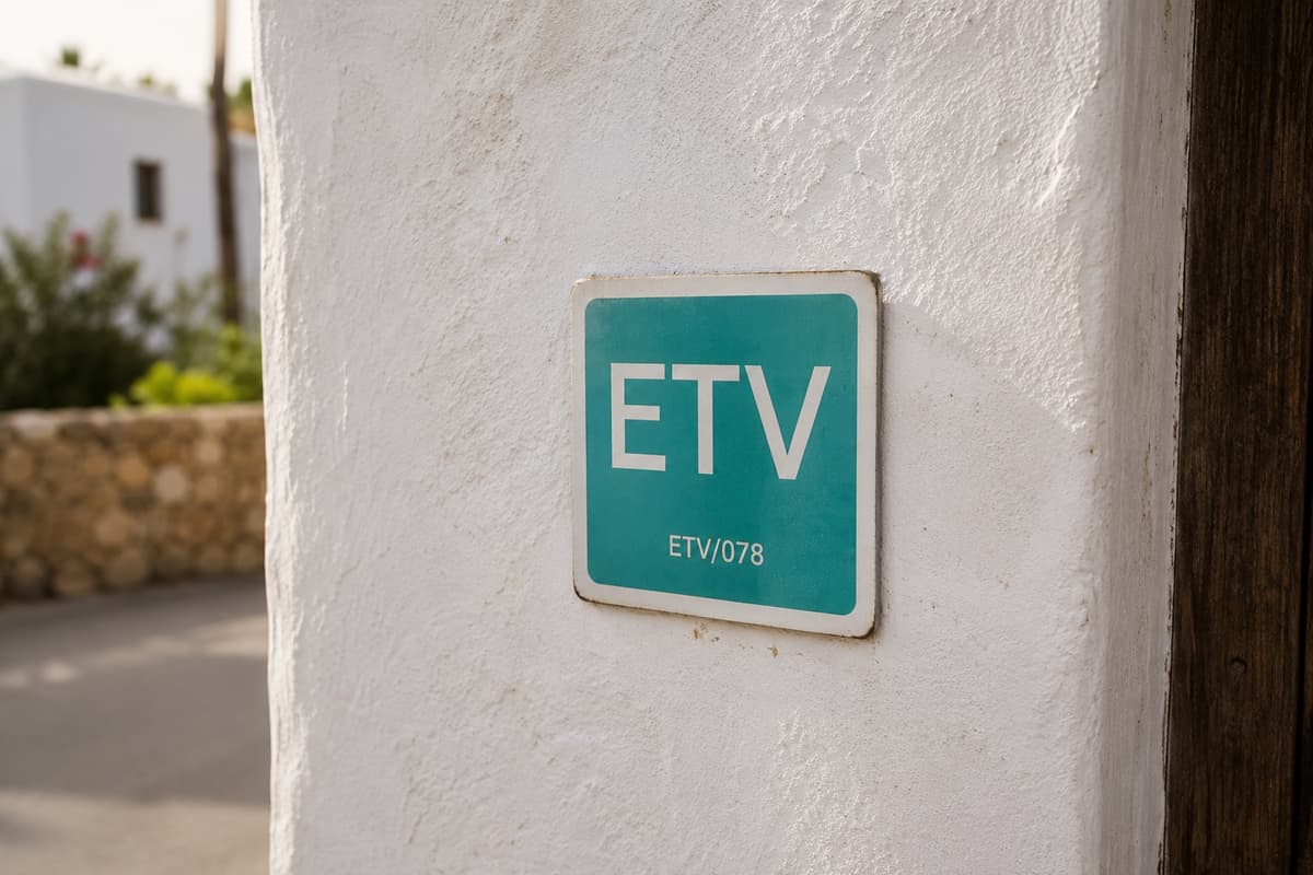 ETV tourist licence plaque mounted on a whitewashed Ibiza villa wall